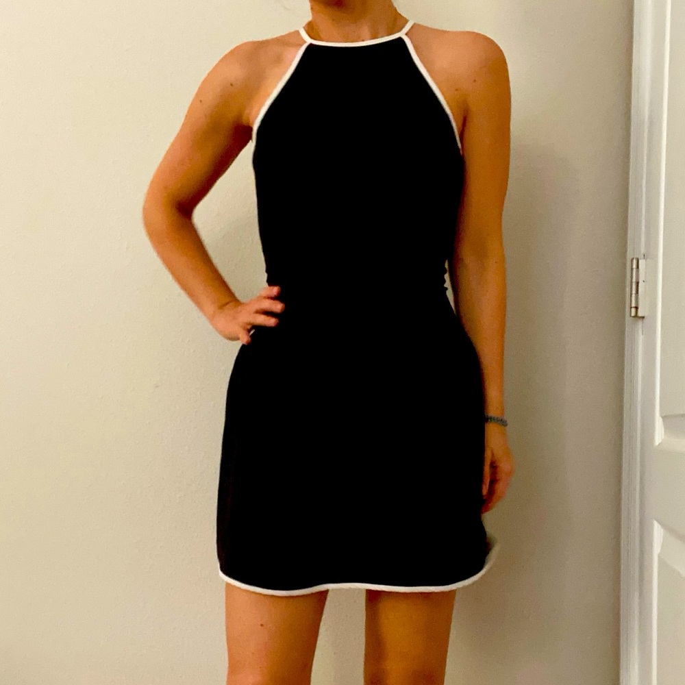 Black cocktail dress with white detail